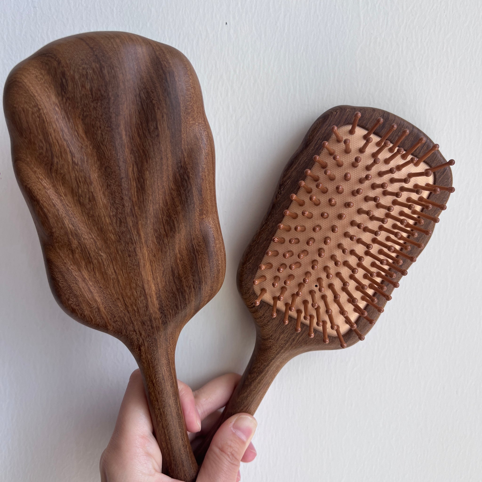 Golden sandalwood massage comb with a smooth and comfortable texture