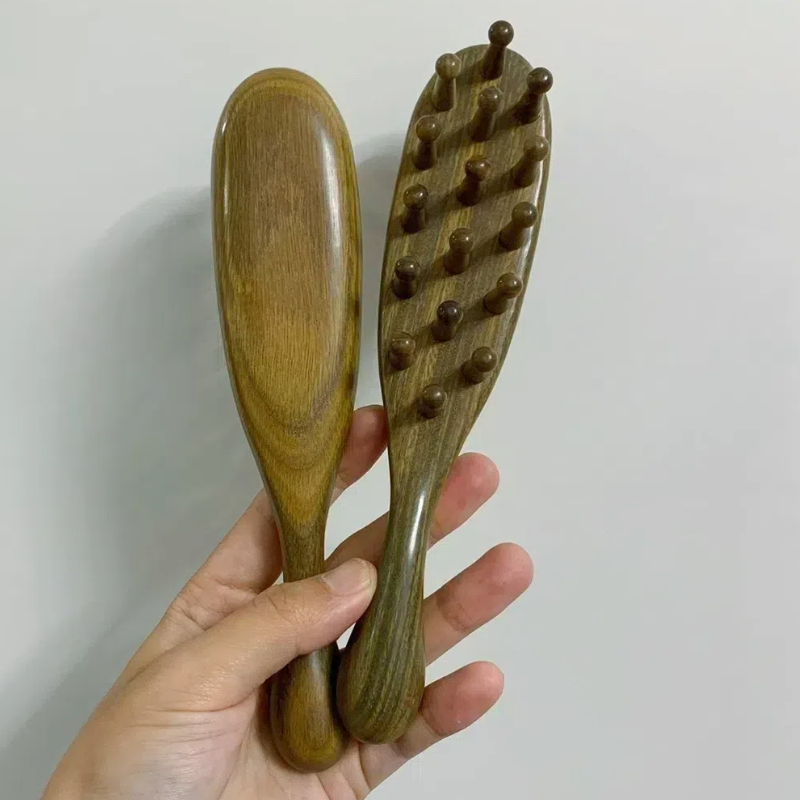 Front and back view of Joy Garden Green Sandalwood Hair Brush – medium firmness wooden paddle design without packaging