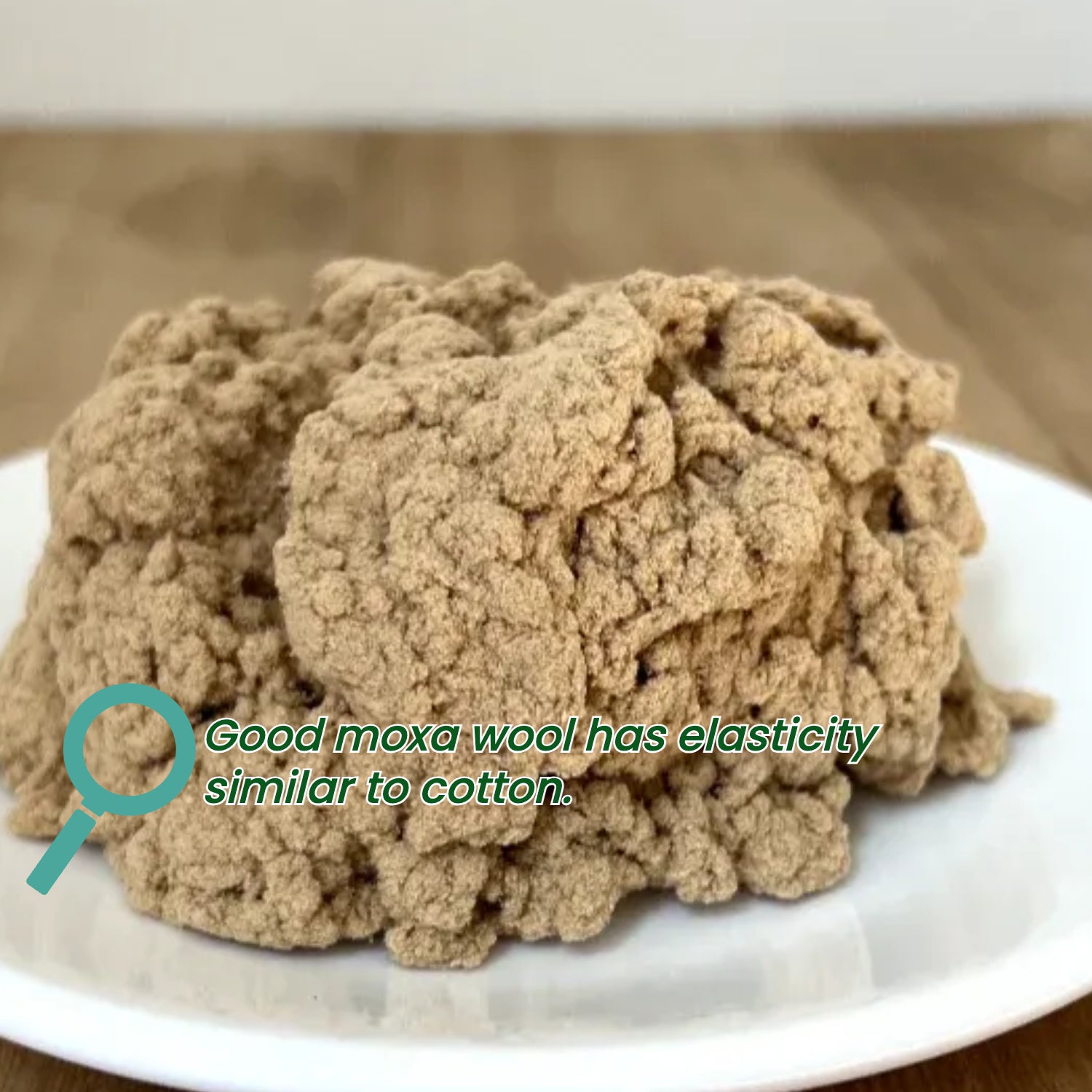 Close-up of Joy Garden premium moxa wool showing soft cotton-like elasticity and high fiber quality