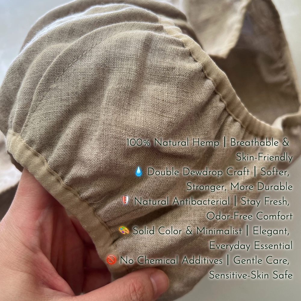 Hand holding Joy Garden 100% natural hemp briefs, highlighting its minimalist design and inherent antibacterial properties.