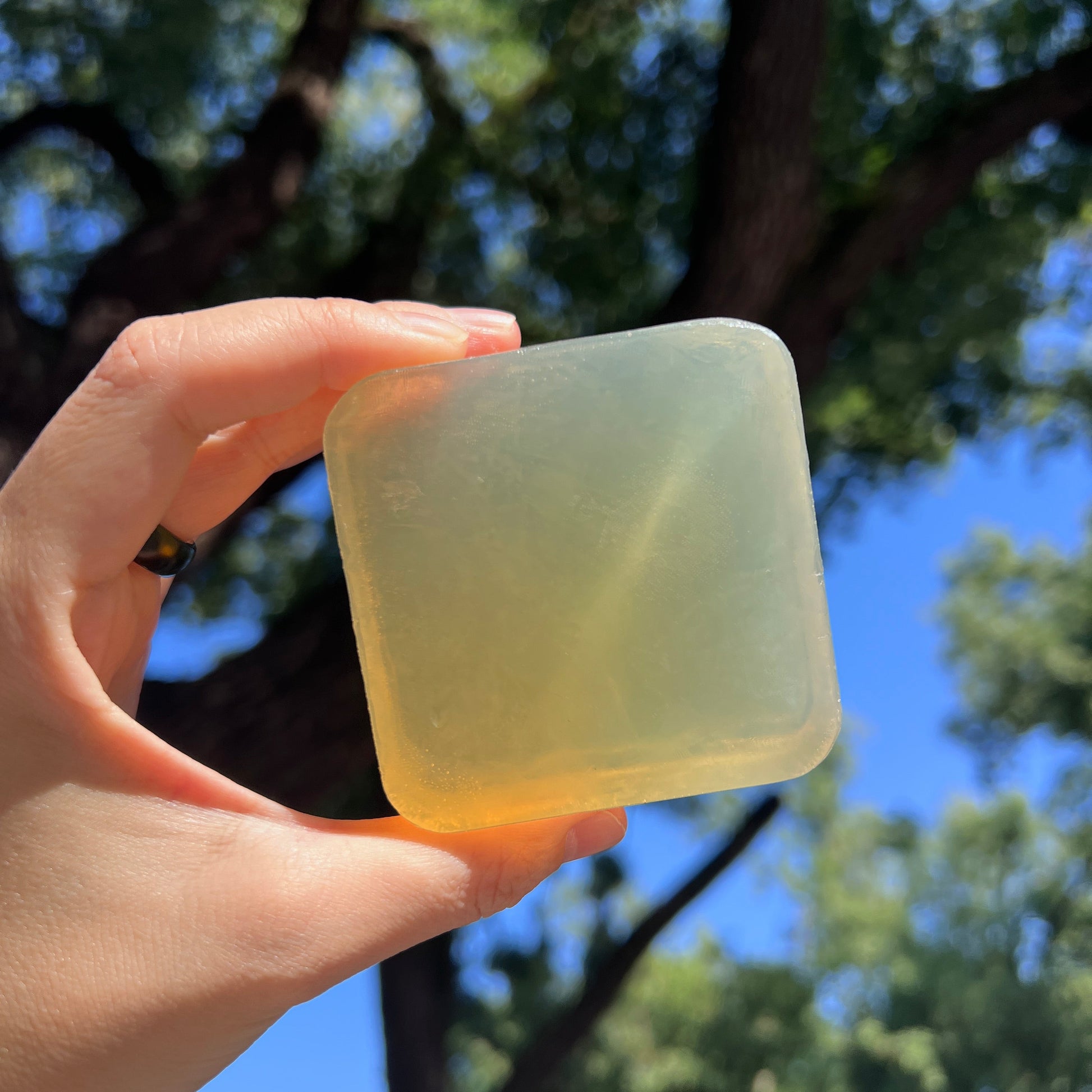 Unwrapped Joy Garden Hinoki Silk Protein Soap bar showing natural texture