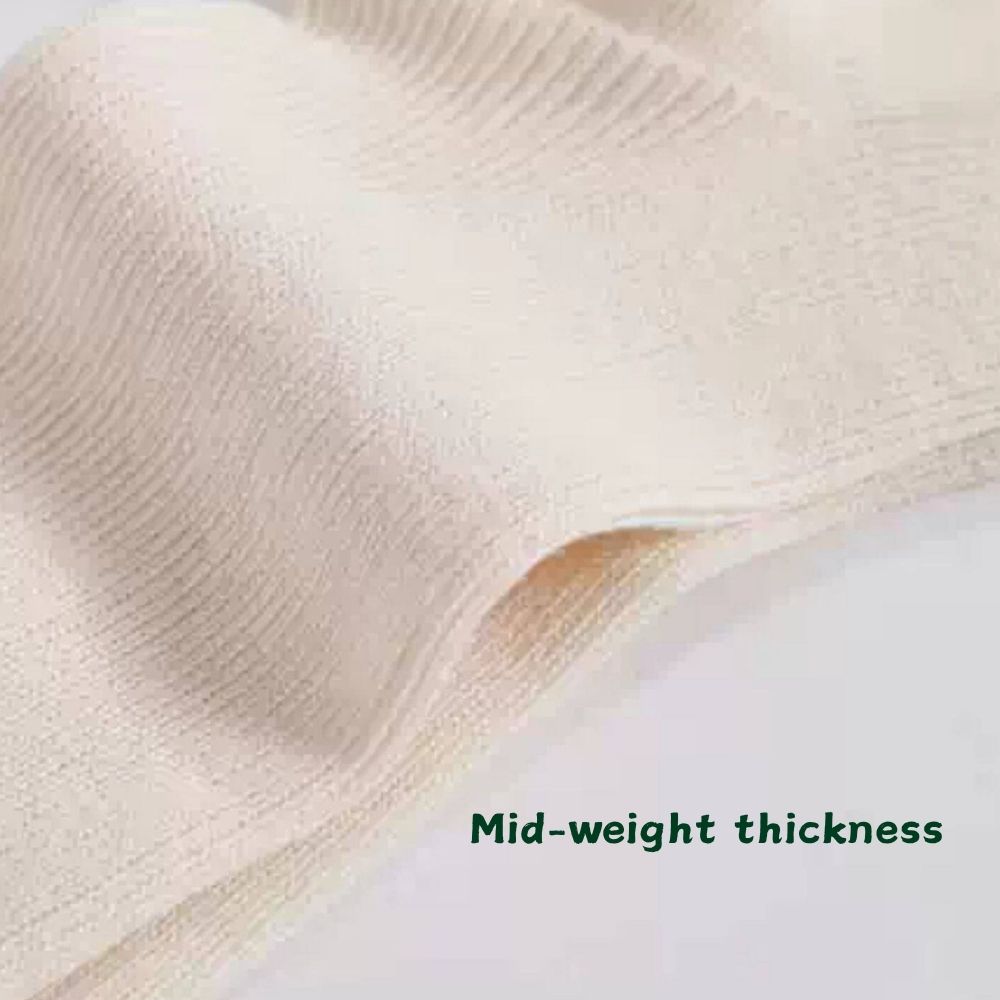 Detail view showing the breathable medium thickness of Joy Garden 100% organic cotton sleep socks.
