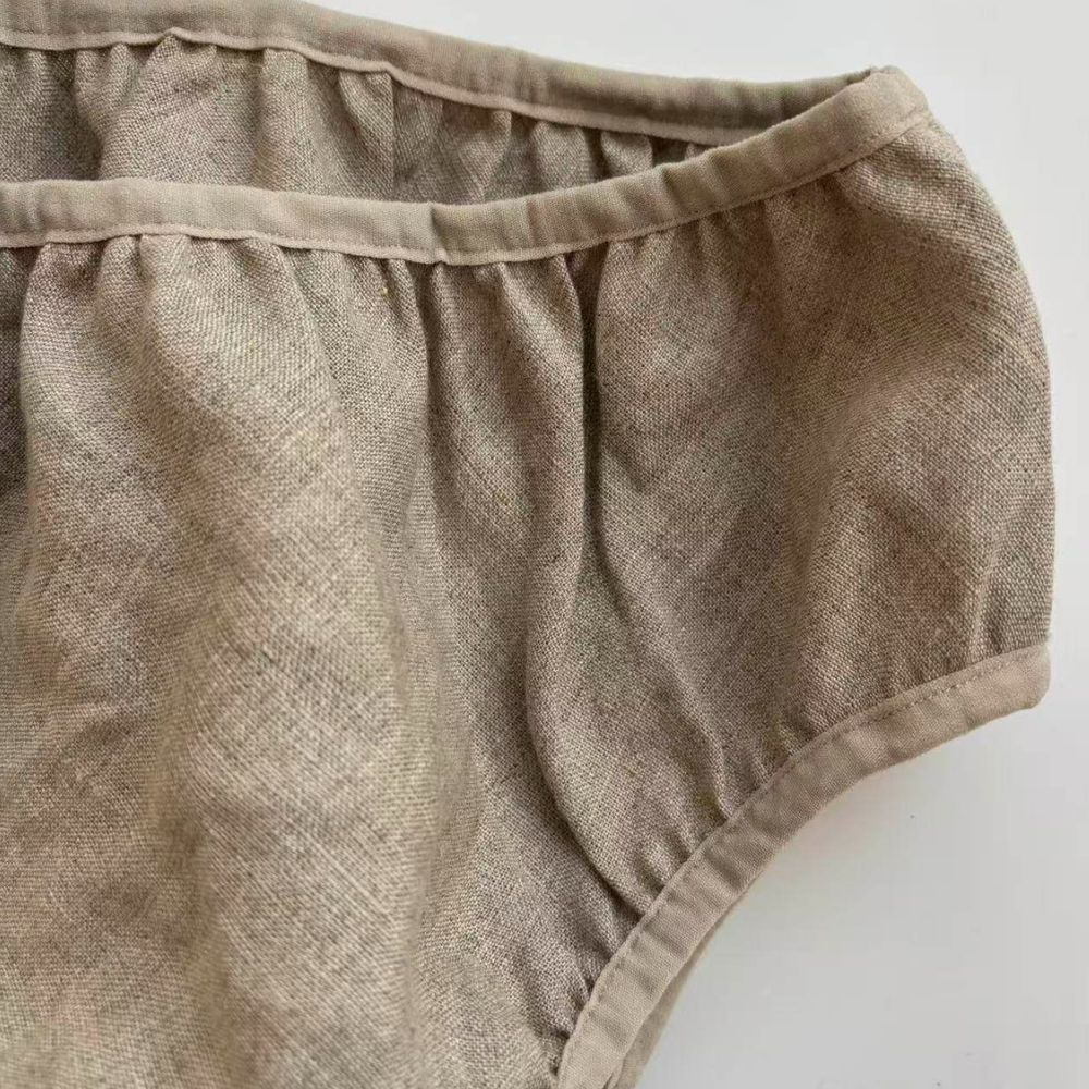 Mid-high rise hemp briefs designed to cover the Guan Yuan (CV4) point for enhanced pelvic circulation and abdominal warmth.